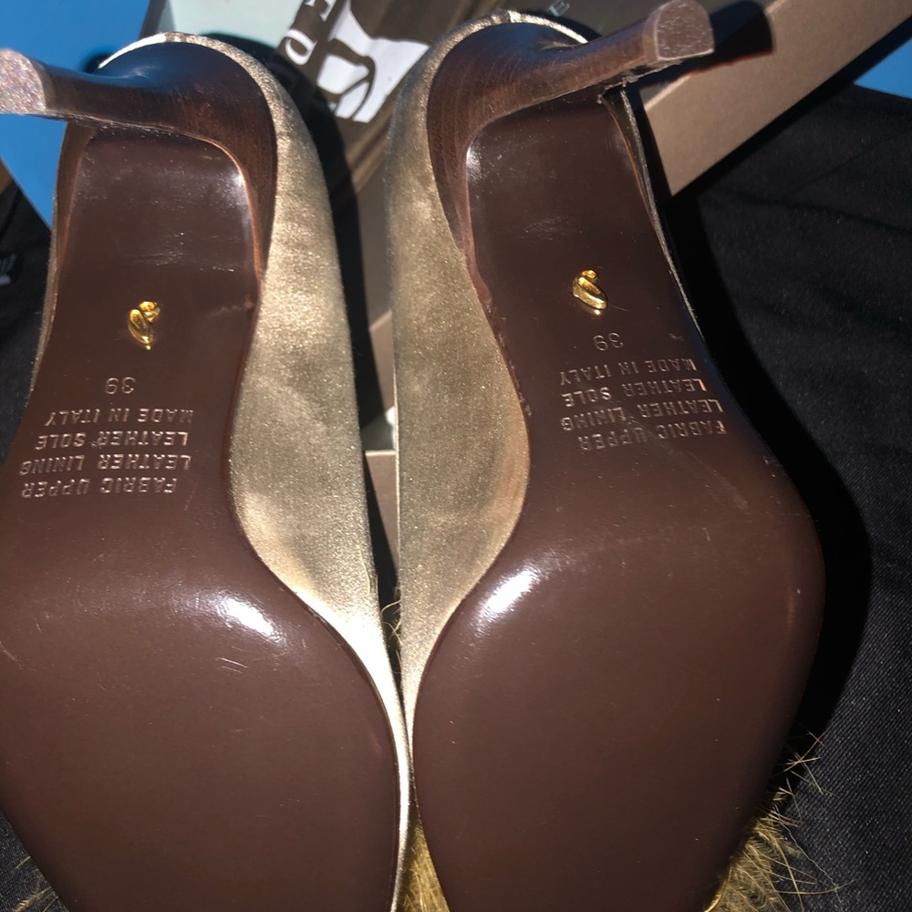 Terre Peck women’s dressy satin pumps.
